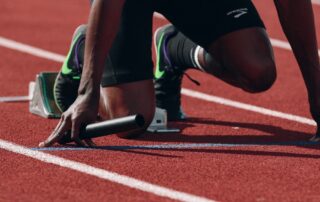 An athlete getting ready to run