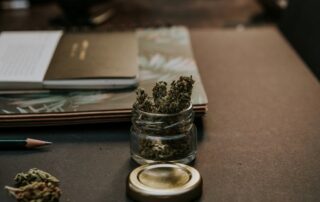 Marijuana kush placed in an open jar
