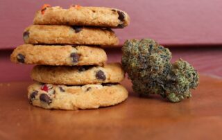 Marijuana cookies next to some cannabis