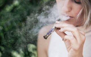 Person vaping medical marijuana in New York