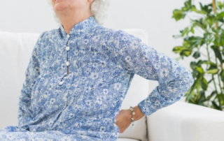 An old woman with back ache.